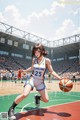 A woman in a basketball uniform dribbling a basketball on a court.